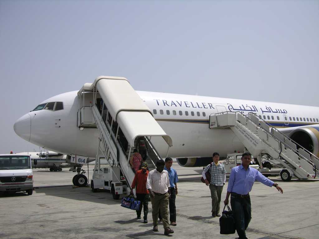 Muscat 01 02 Disembark Airplane We landed at Seeb International Airport, a hub for Gulf Air, the national carrier of Oman, and quickly picked up our luggage and in a few minutes filed through Customs and Immigration.